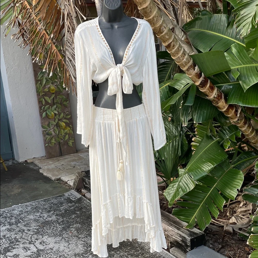 Bell sleeve ruffle top and matching gold striped high low skirt
